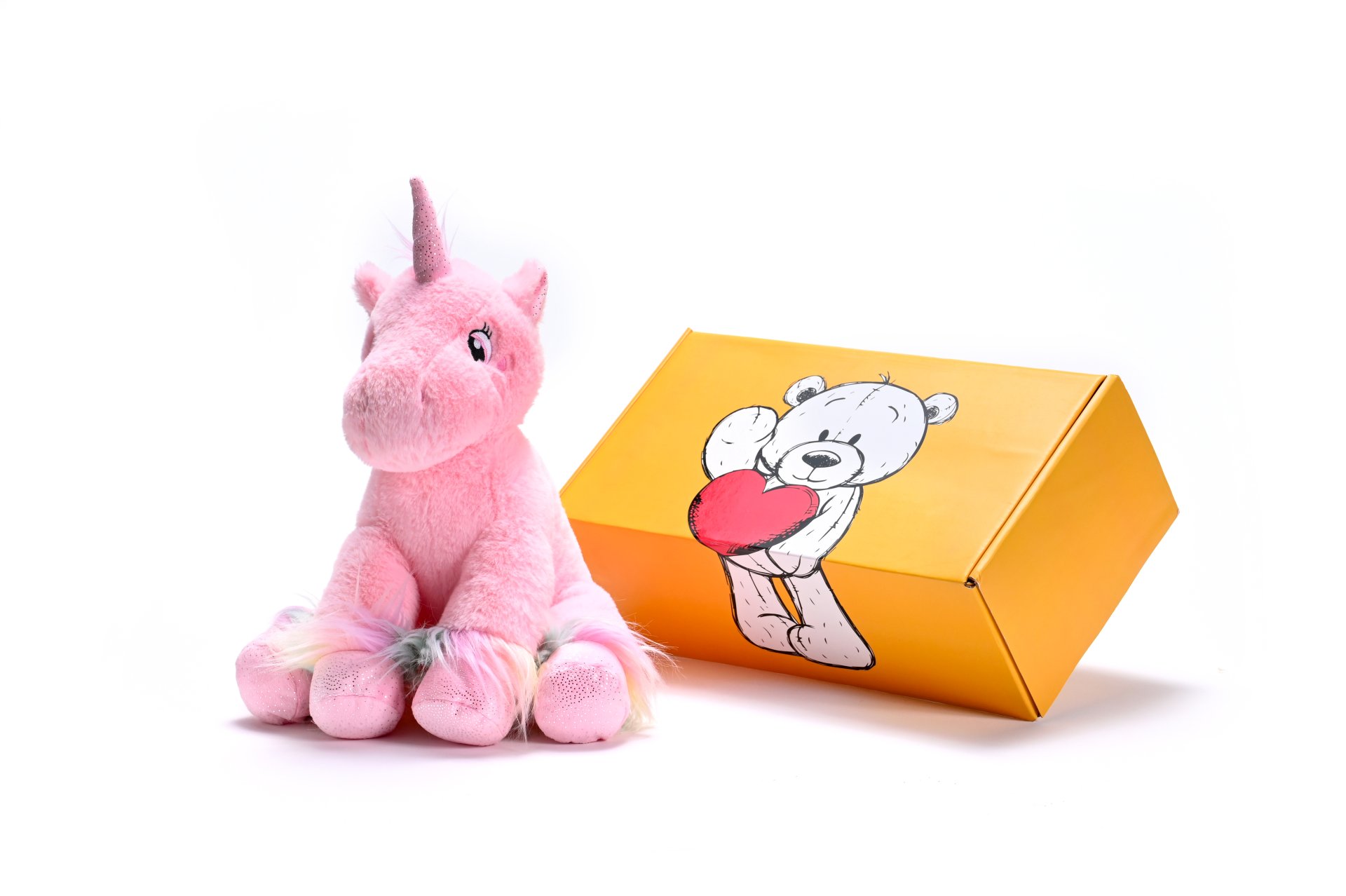 Pink unicorn soft toy