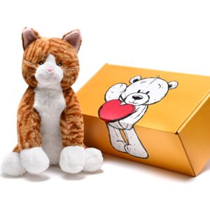 a stuffed cat toy next to a box